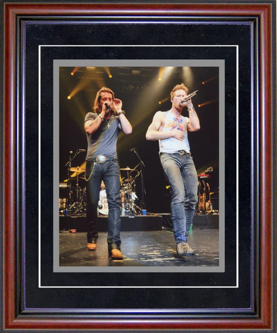 Florida Georgia Line Unsigned Framed 8x10 Photo: Florida Georgia Line Unsigned Framed 8x10 Photo Framed in a beautiful cherry wood frame, this unsigned 8x10 photo features Florida Georgia Line. The black on matte white board adds depth and contrast