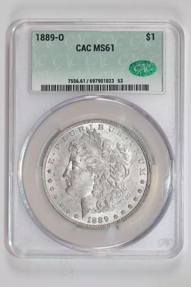 1889-O MORGAN DOLLAR CACG MS61: 1889-O MORGAN DOLLAR CACG MS61 The 1889-O Morgan Dollar CAC MS61 boasts a rich history, bearing the mark of the New Orleans Mint. With its silver composition and high-grade MS61 rating, this coin is