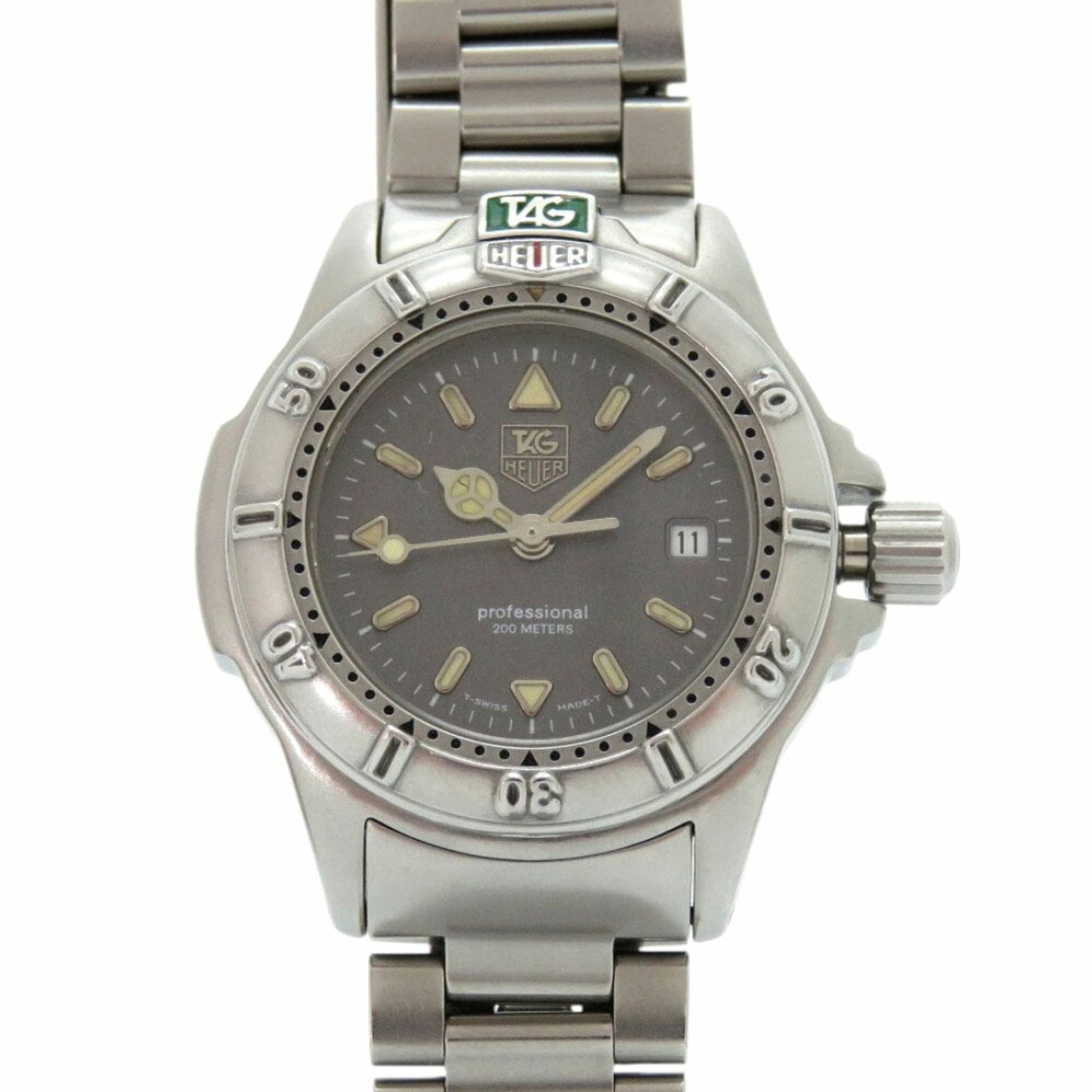 Tag Heuer Wristwatch: Tag Heuer Wristwatch Stainless steel case and band, the Tag Heuer wristwatch features a sleek 30mm diameter. With its classic design, it's a great option for those looking for a reliable timepiece. Tr