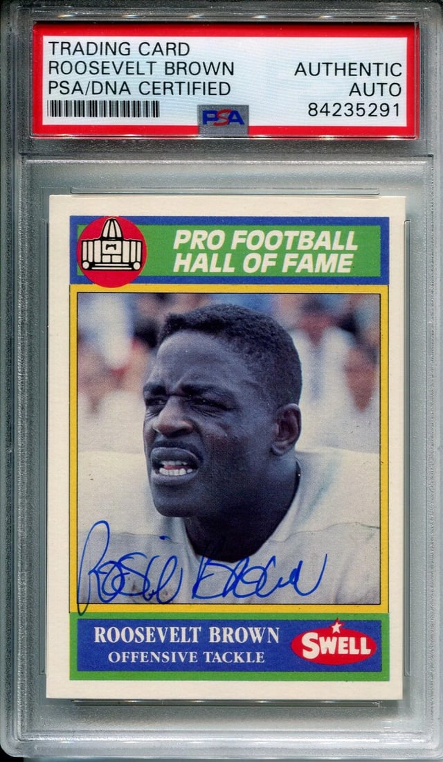 Swell football card autographed by Roosevelt Brown in 1990 PSA: Swell football card autographed by Roosevelt Brown in 1990 PSA Roosevelt Brown's sharpie signature spans the front of this 1990 Swell football card, authenticated and slabbed by PSA. The card bears a