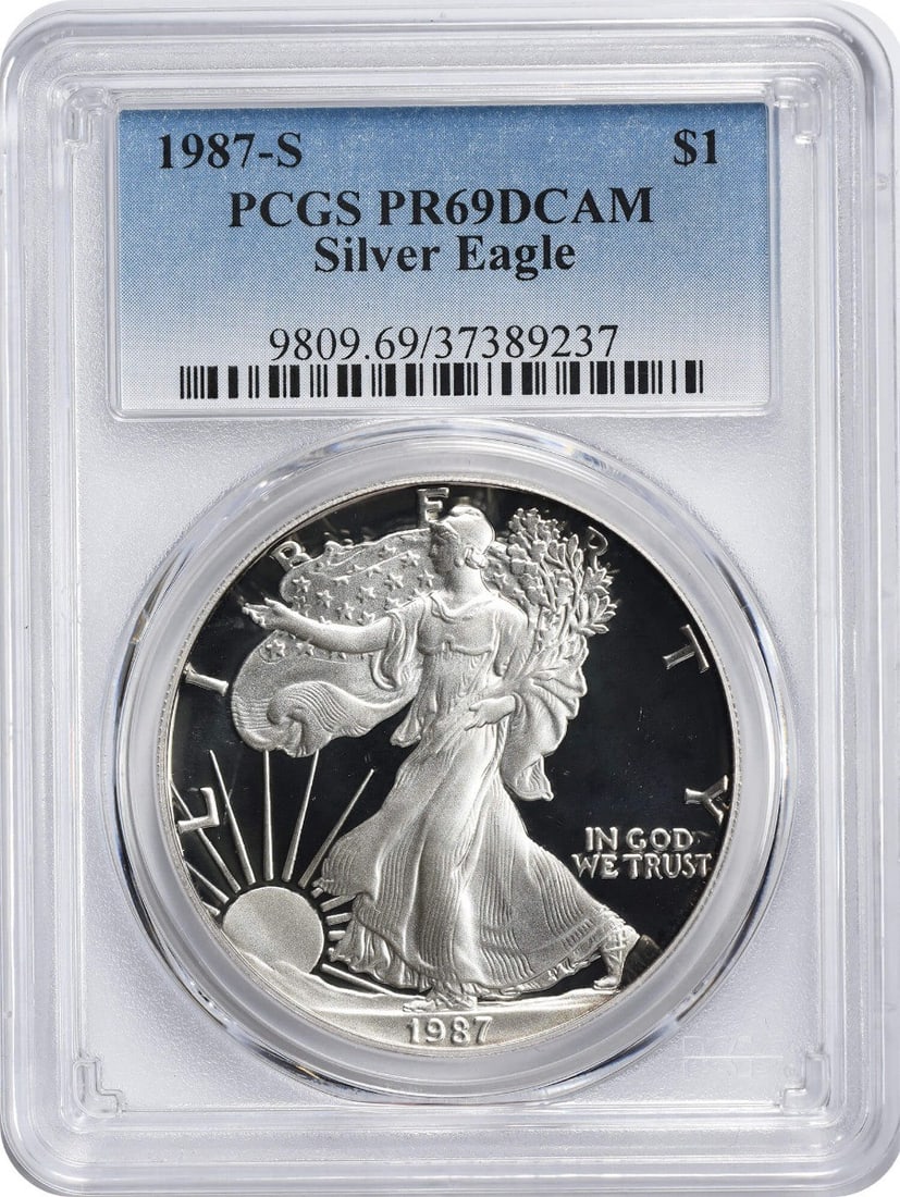 1987-S American Silver Eagle Dollar PR69DCAM PCGS Proof 69 Deep Cameo: 1987-S American Silver Eagle Dollar PR69DCAM PCGS Proof 69 Deep Cameo The 1987-S American Silver Eagle Dollar PR69DCAM PCGS Proof 69 Deep Cameo boasts exceptional condition, with its proof grade of PR