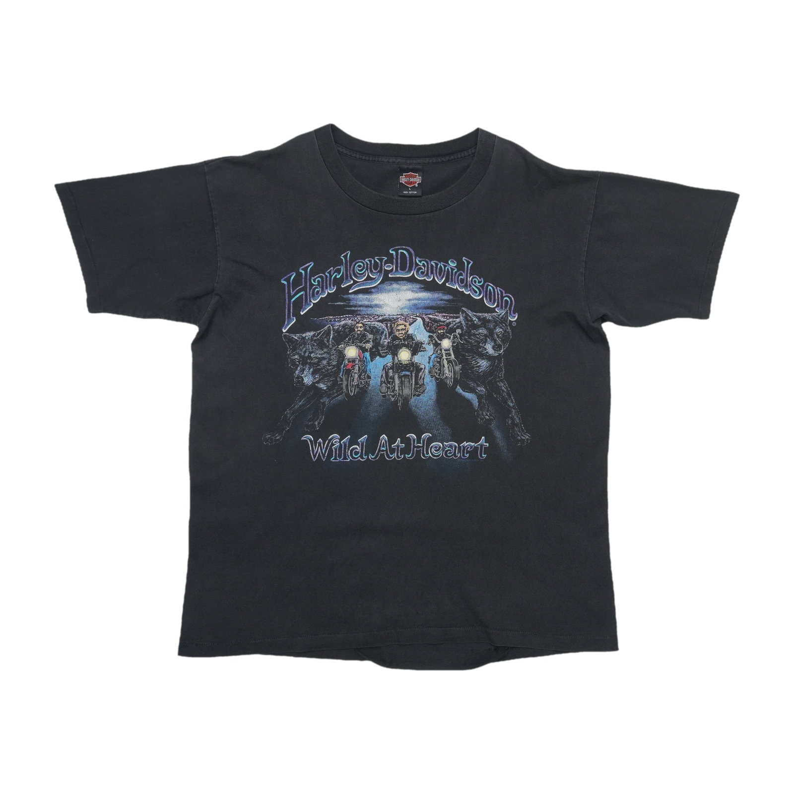 1990s Harley Davidson Englewood Colorado Wild At Heart Shirt: 1990s Harley Davidson Englewood Colorado Wild At Heart Shirt The 1990s Harley Davidson Englewood Colorado Wild At Heart Shirt is a true vintage find, boasting an iconic design and bold color.