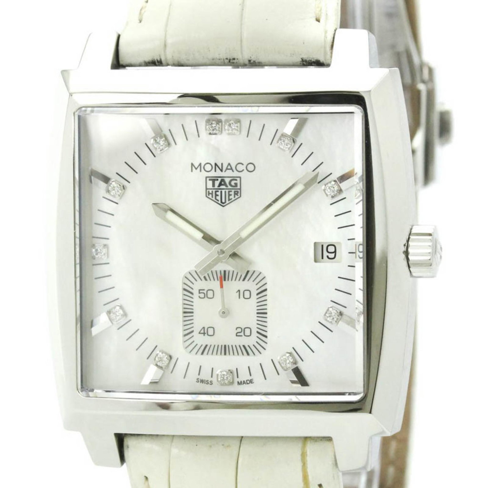 Tag Heuer Wristwatch: Tag Heuer Wristwatch Stainless steel case and leather band make for a durable and stylish combination. The white dial provides a clean backdrop for the watch's sporty design, with a diameter of 37mm t