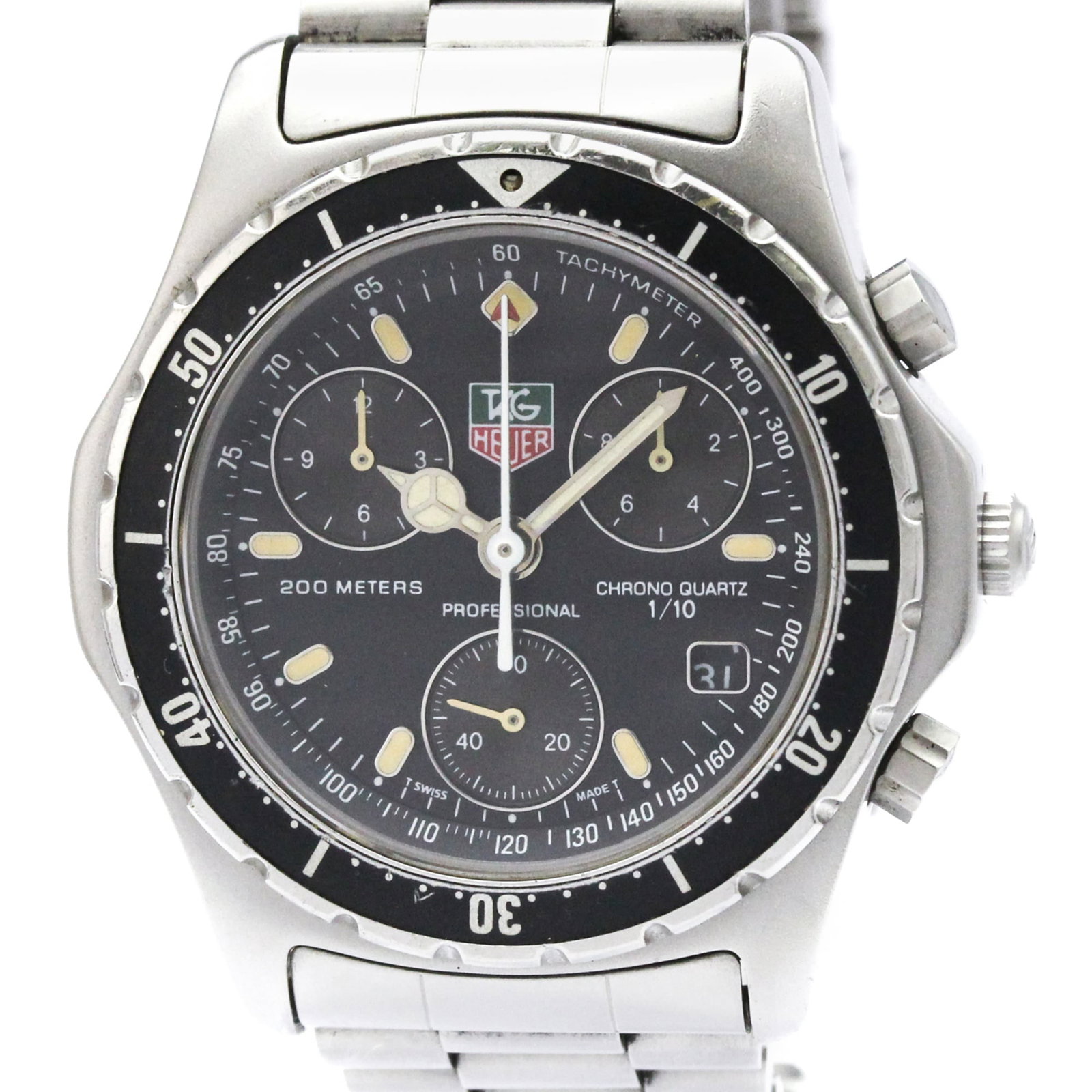 Tag Heuer Wristwatch: Tag Heuer Wristwatch Stainless steel case and band, the Tag Heuer wristwatch boasts a sleek black dial. With its sporty design, this watch is perfect for everyday wear. Traces of usage are visible,