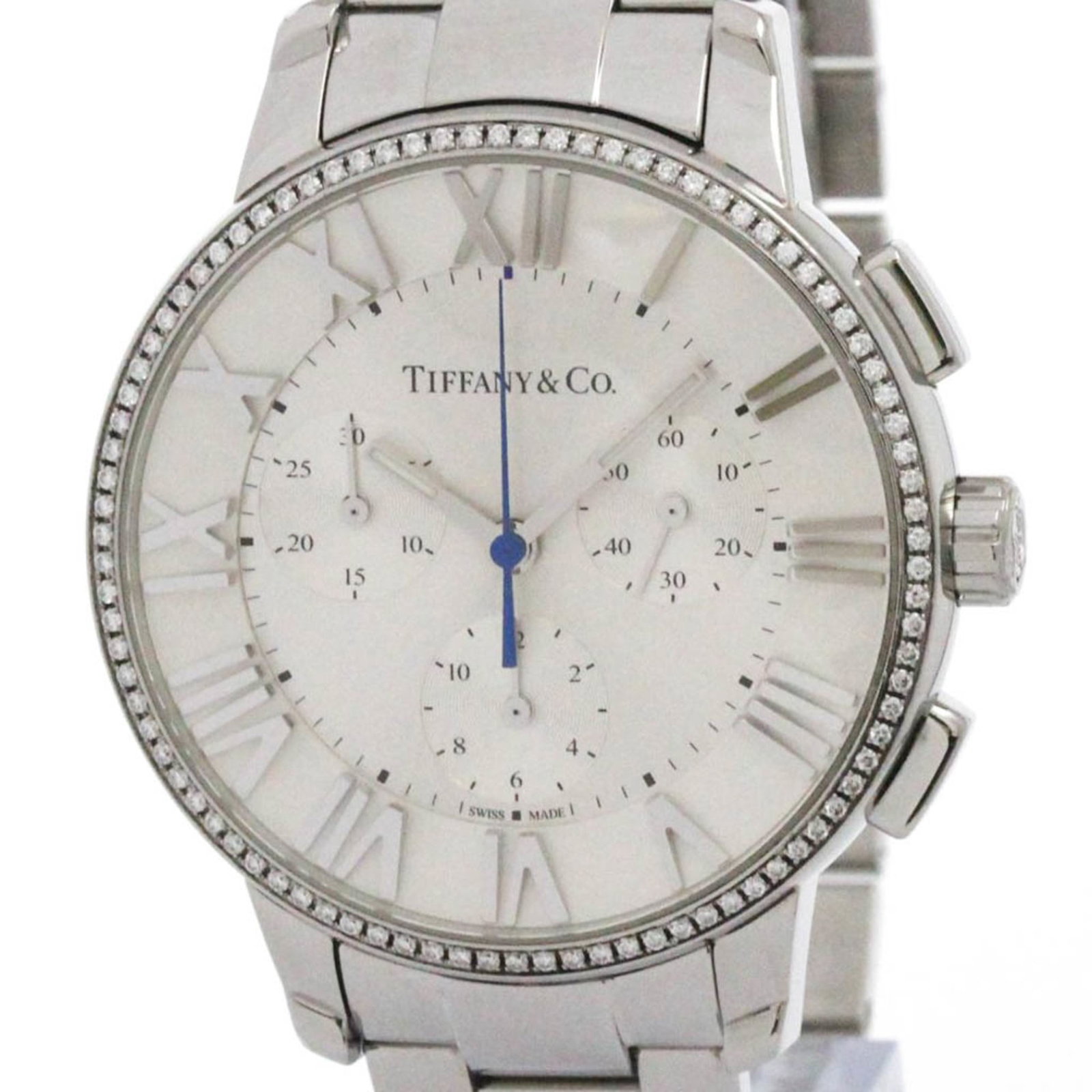 Wristwatch of Tiffany: Wristwatch of Tiffany Stainless steel case and band, silver dial, and classic design make this Tiffany Type wristwatch a timeless piece. With its 36mm diameter and used condition featuring some scratc
