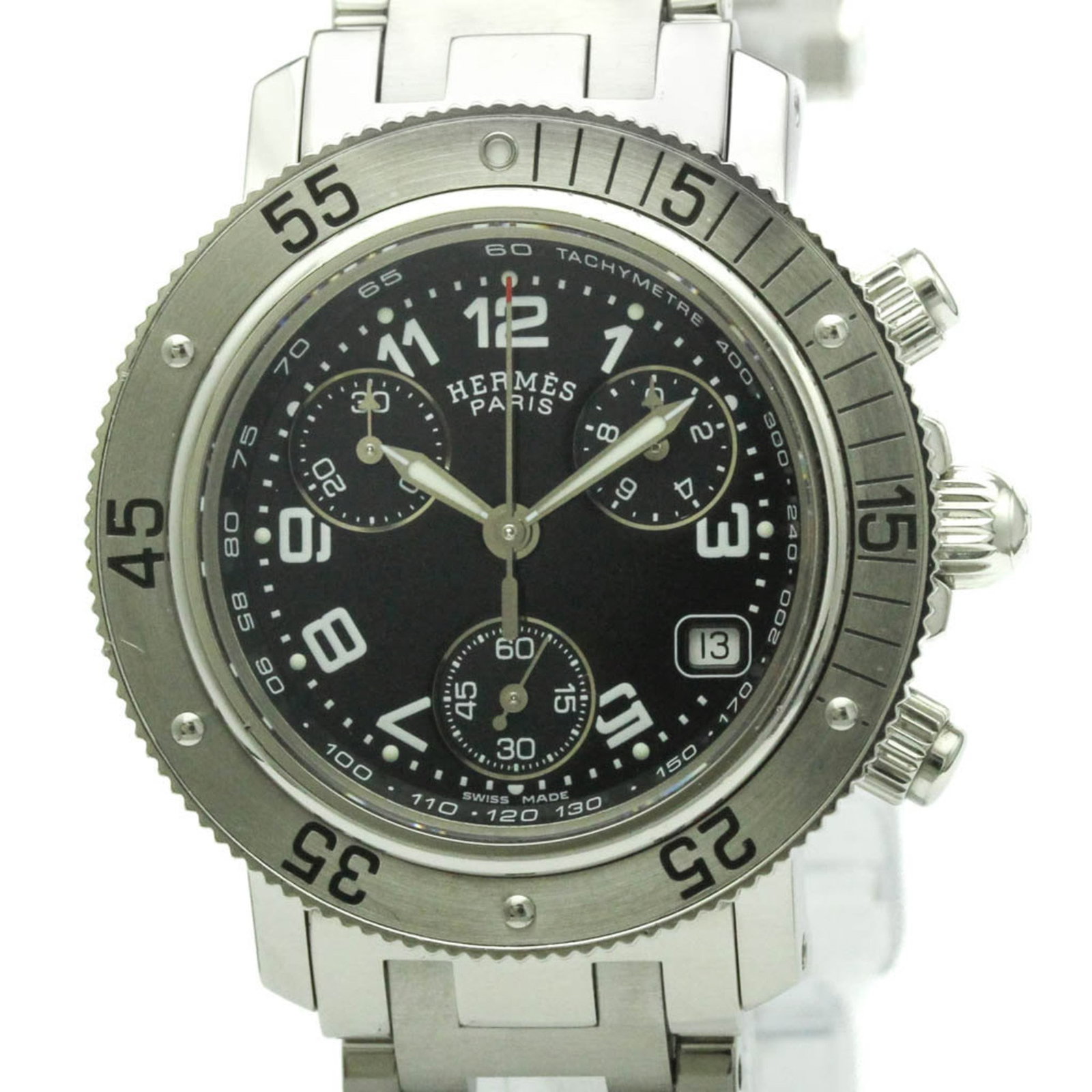 Hermes Wristwatch: Hermes Wristwatch Stainless steel case and band provide a sleek, sporty look for women. The black dial adds a touch of sophistication to this Hermes wristwatch, which features a diameter of 33mm. With