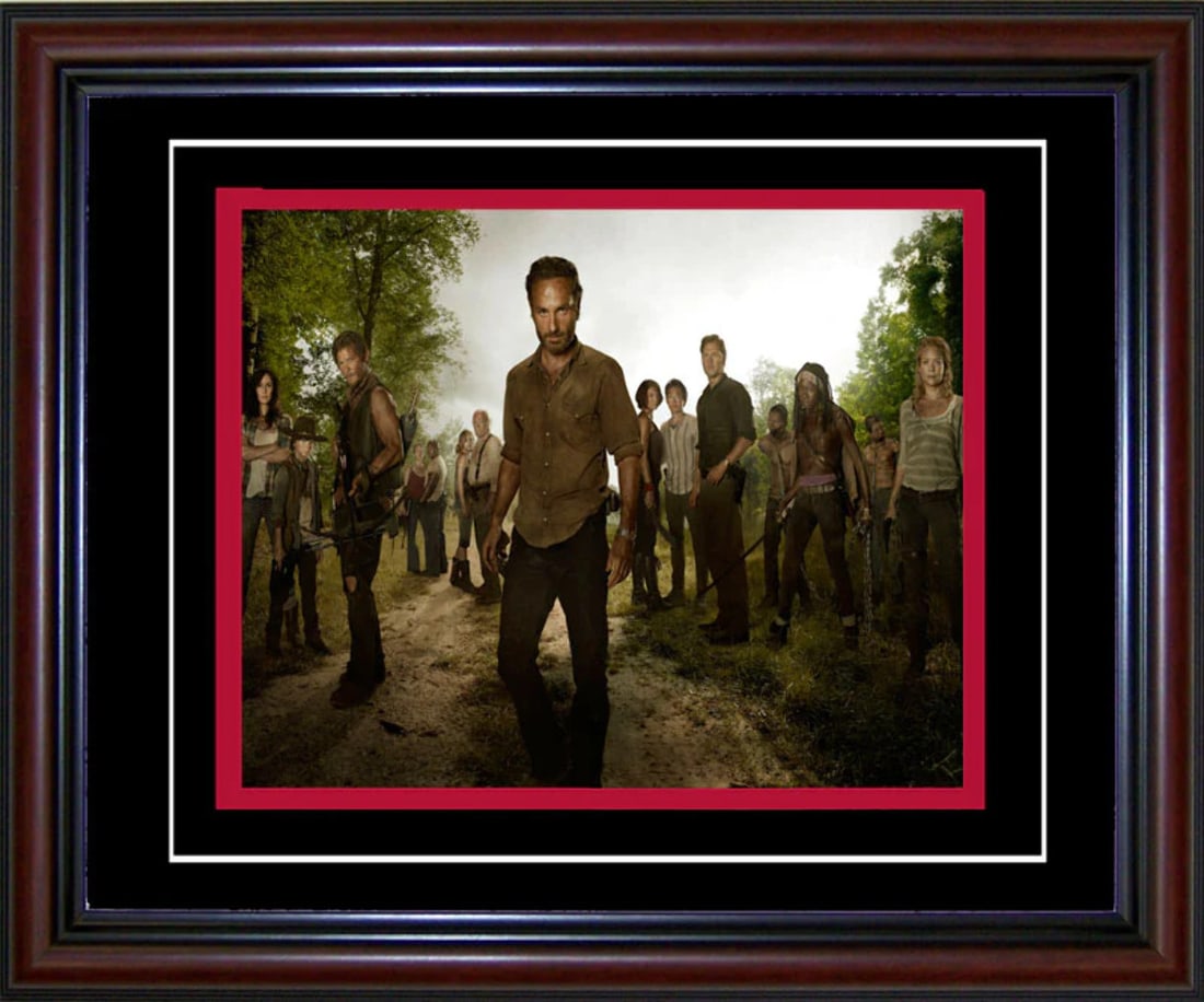 The Walking Dead Unsigned Framed 8x10 Photo: The Walking Dead Unsigned Framed 8x10 Photo The Walking Dead Unsigned Framed 8x10 Photo bears a signature in a cherry wood frame with black on red matte board. The show, developed by Frank Darabont