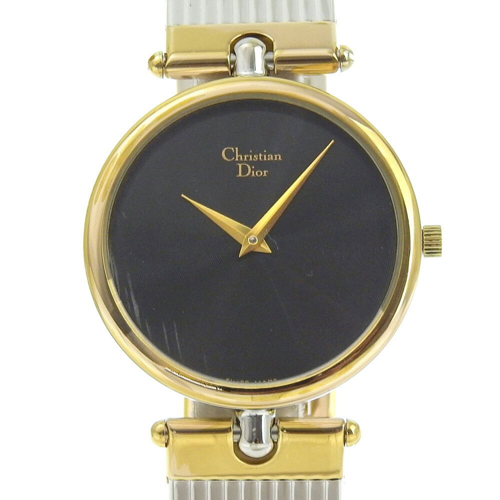 Christian Dior Wristwatch: Christian Dior Wristwatch Gold plated case and stainless steel band add a touch of sophistication to this Christian Dior wristwatch, featuring a sleek black dial. The watch's 30mm diameter case fits c