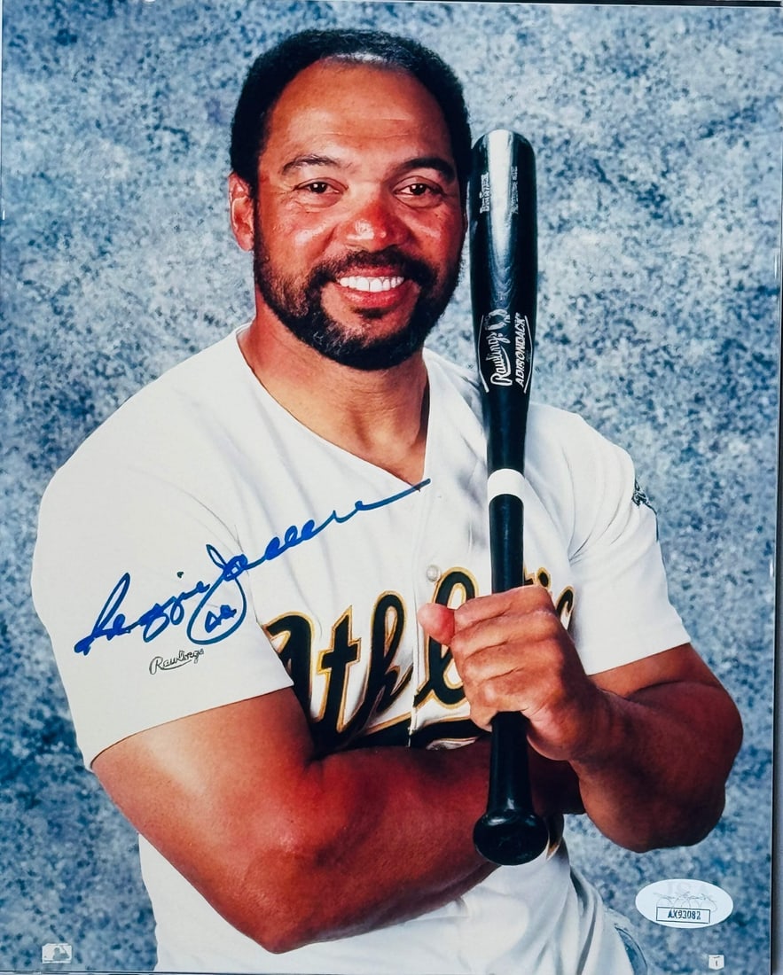 Reggie Jackson Autographed 8x10 Baseball Photo (JSA): Reggie Jackson Autographed 8x10 Baseball Photo (JSA) Reggie Jackson's distinctive blue signature marks the front of this official 8x10 baseball photo, bearing witness to his legendary status in