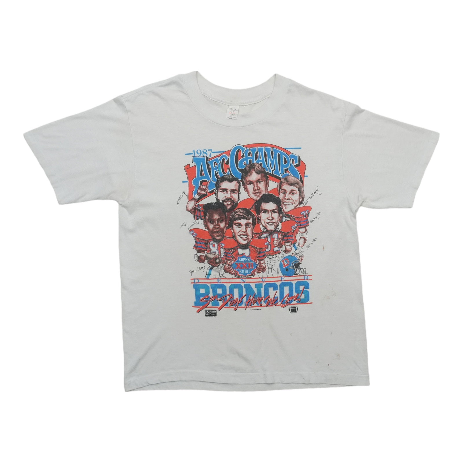 1987 Denver Broncos AFC Champs Shirt: 1987 Denver Broncos AFC Champs Shirt Worn by Broncos fans in '87, this vintage 1987 Denver Broncos AFC Champs Shirt boasts a classic design with a 19" pit-to-pit length and adjustable collar. Made fro