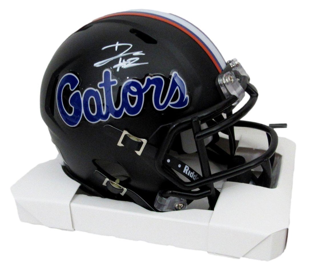 D. J. Lagway Signed/ Auto Black Matte Mini Football Helmet Florida JSA 197053: D. J. Lagway Signed/ Auto Black Matte Mini Football Helmet Florida JSA 197053 Signed by D.J. Lagway, the renowned artist behind the iconic Black Matte Mini Football Helmet, this Florida-licensed item