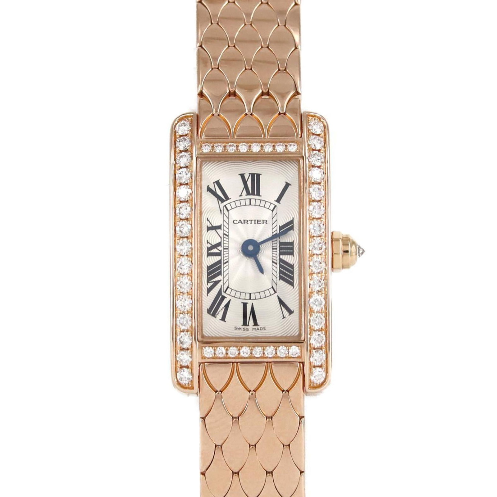 Cartier Wristwatch: Cartier Wristwatch Pink gold and rose gold tones blend in harmony, creating a sophisticated silver dial on this Cartier wristwatch. Measuring 15mm in diameter, the watch features a classic design that