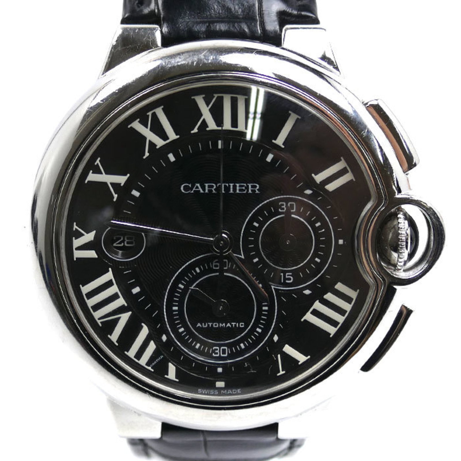 Cartier Wristwatch: Cartier Wristwatch Stainless steel case and leather band make for a timeless combination, while the black dial provides a sleek backdrop for everyday wear. This Cartier wristwatch boasts a classic des