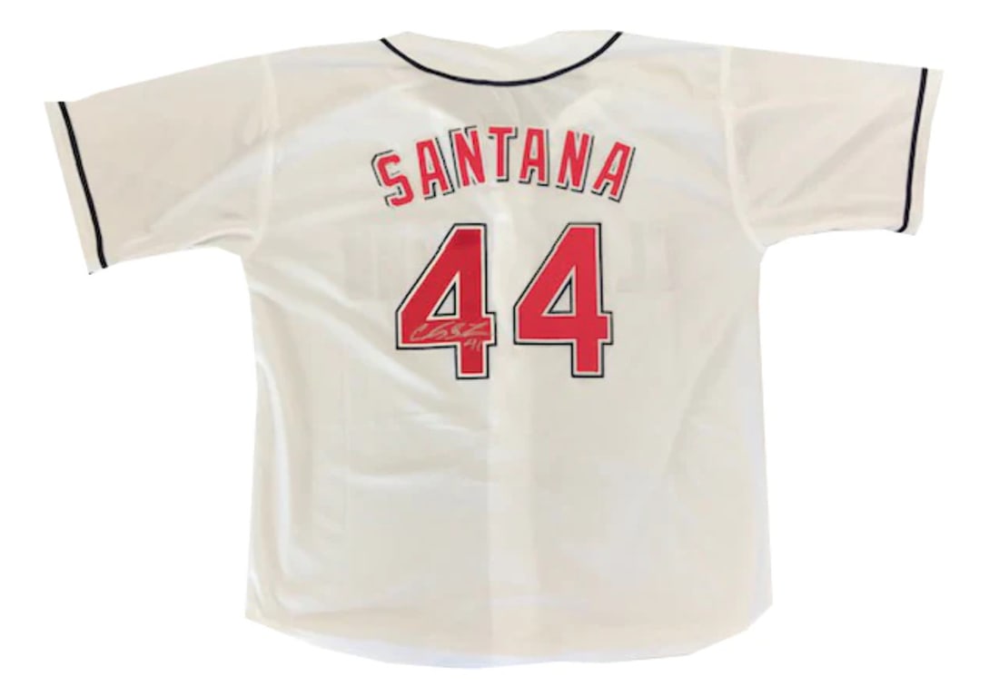 Carlos Santana Autographed Cleveland Indians Jersey: Carlos Santana Autographed Cleveland Indians Jersey Item Specifics: Signed in silver sharpie across the number on the back of the jersey Autograph is authenticated by , and will be accompanied by a
