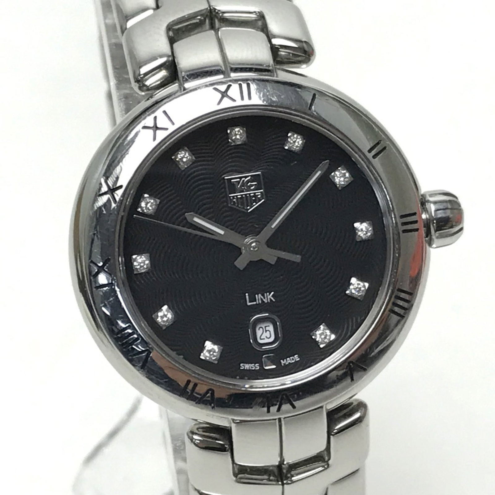 Tag Heuer Wristwatch Other: Tag Heuer Wristwatch Other Tag Heuer wristwatch in black, featuring a 6.5inch / 16.5cm band length and 0.6inch / 1.5mm band width, with traces of usage visible due to scratches and dirt that can be