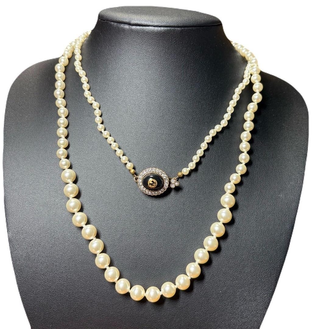 Gucci Interlocking G Pearl Stone Necklace Long Black In Rare: Gucci Interlocking G Pearl Stone Necklace Long Black In Rare Item Specifics: Color: Gold Material: Rhinestone Main Stone Color: White Main Stone: Pearl Brand: Gucci Type: Necklace Style: necklace Prod