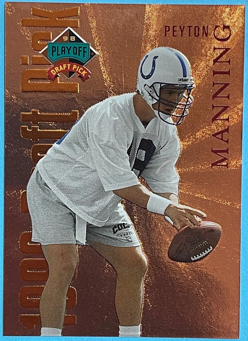 Prestige Pick Peyton Manning Bronze 1998 Draft Card: Prestige Pick Peyton Manning Bronze 1998 Draft Card Prestige Pick Peyton Manning Bronze 1998 Draft Card features a bronze finish, commemorating Peyton Manning's draft in the 1998 NFL Draft. This card