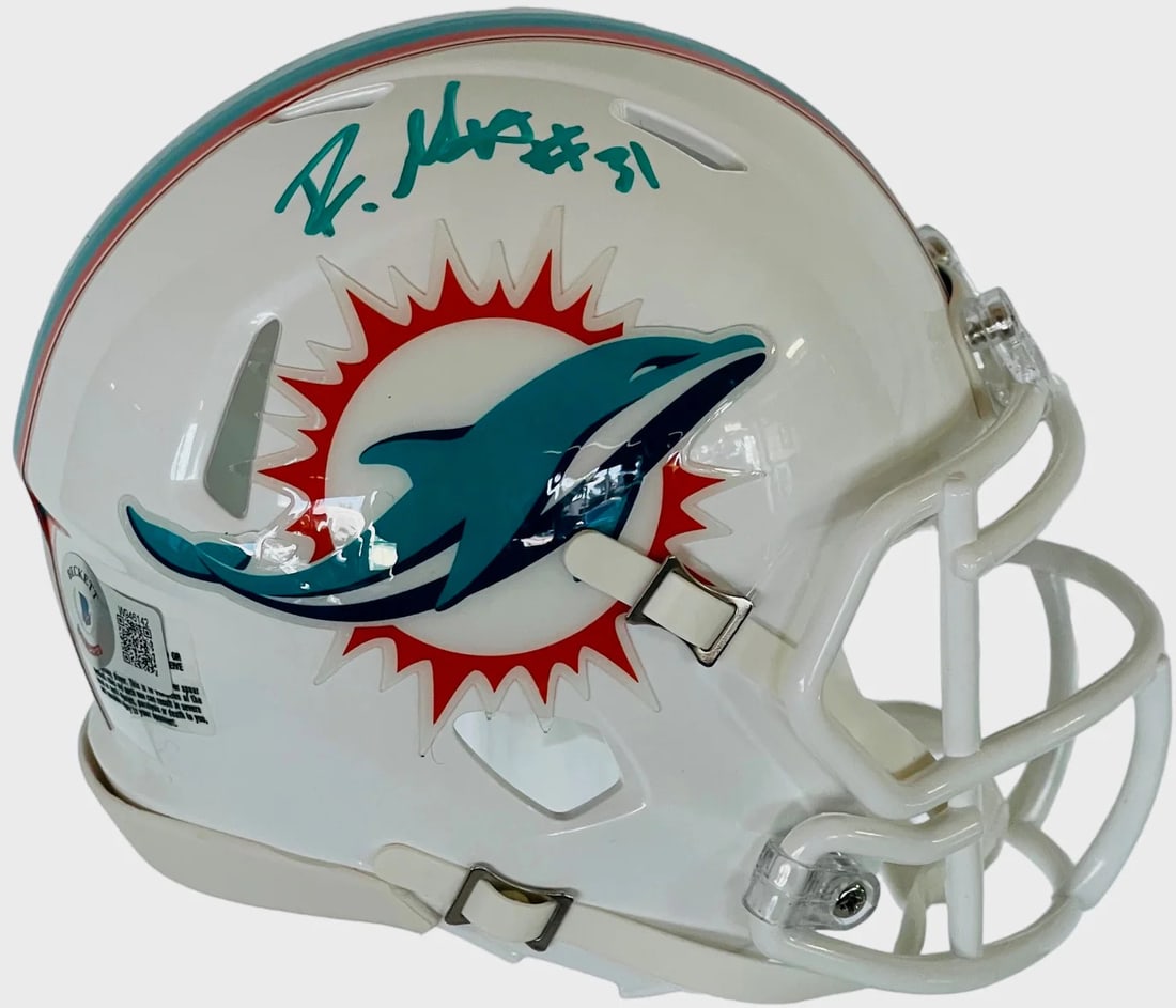 Mostert Helmet Raheem Beckett Autographed: Mostert Helmet Raheem Beckett Autographed Item Specifics: Brand: Beckett Professional Grader: 275013 Raheem Mostert Autographed Mini Helmet.This mini helmetis signed in teal paint pen above the