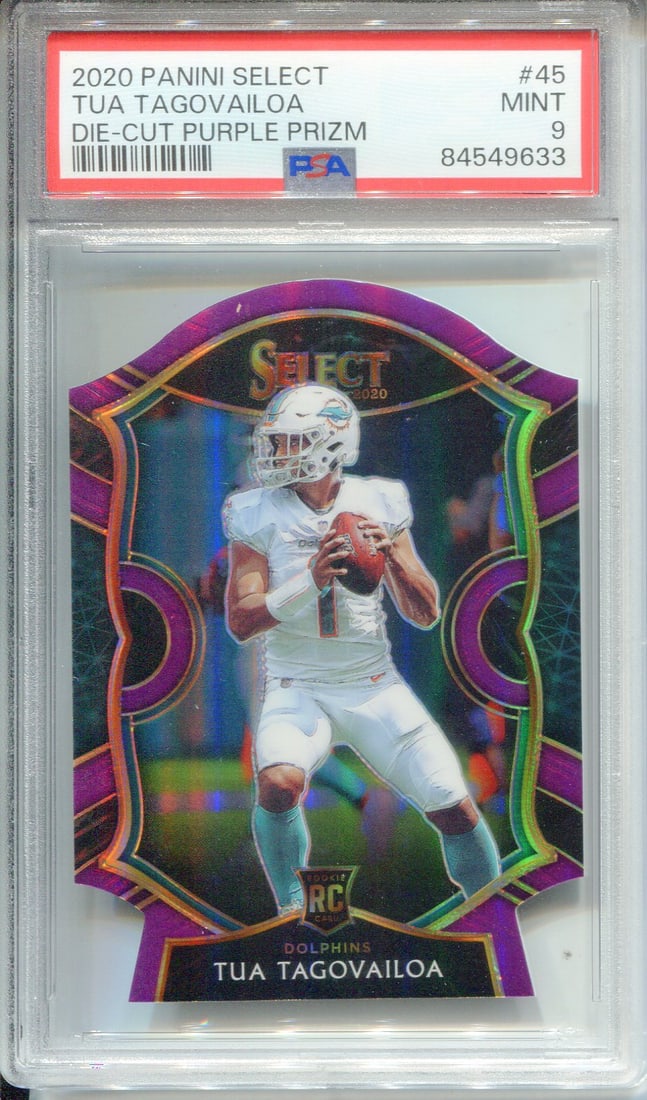 Tua Tagovailoa 2020 Panini Select Die Cut Purple Prizm Rookie Card #45 (PSA 9): Tua Tagovailoa 2020 Panini Select Die Cut Purple Prizm Rookie Card #45 (PSA 9) Tua Tagovailoa's 2020 Panini Select Die Cut Purple Prizm Rookie Card #45 boasts a vibrant purple color and die-cut