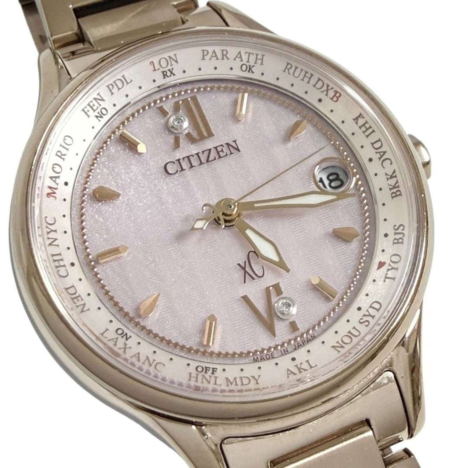 Citizen Wristwatch: Citizen Wristwatch Titanium case and band provide a sleek, modern look. The pink dial adds a touch of femininity to this versatile timepiece. With its compact 28mm size, it's perfect for everyday wear