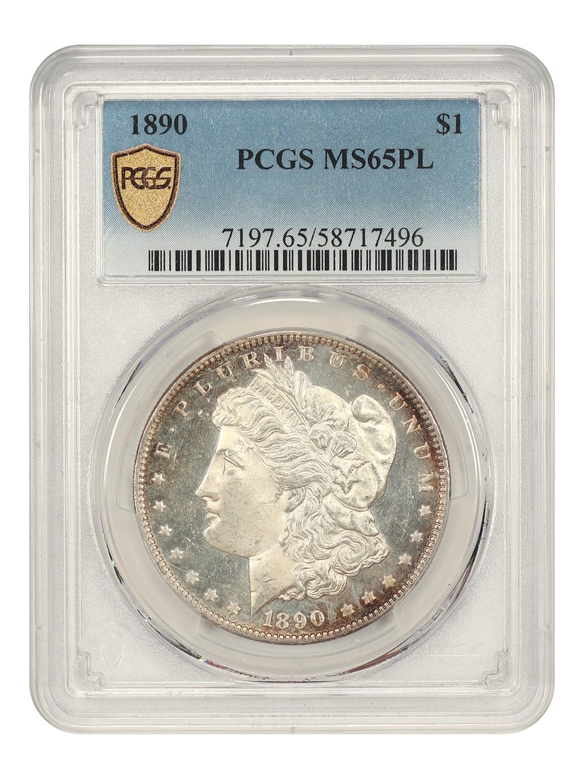1890 $1 PCGS MS65PL - Morgan Dollar: 1890 $1 PCGS MS65PL - Morgan Dollar The 1890 $1 PCGS MS65PL Morgan Dollar boasts an impressive grade of 65, indicating exceptional condition and preservation. This uncirculated coin features the iconi