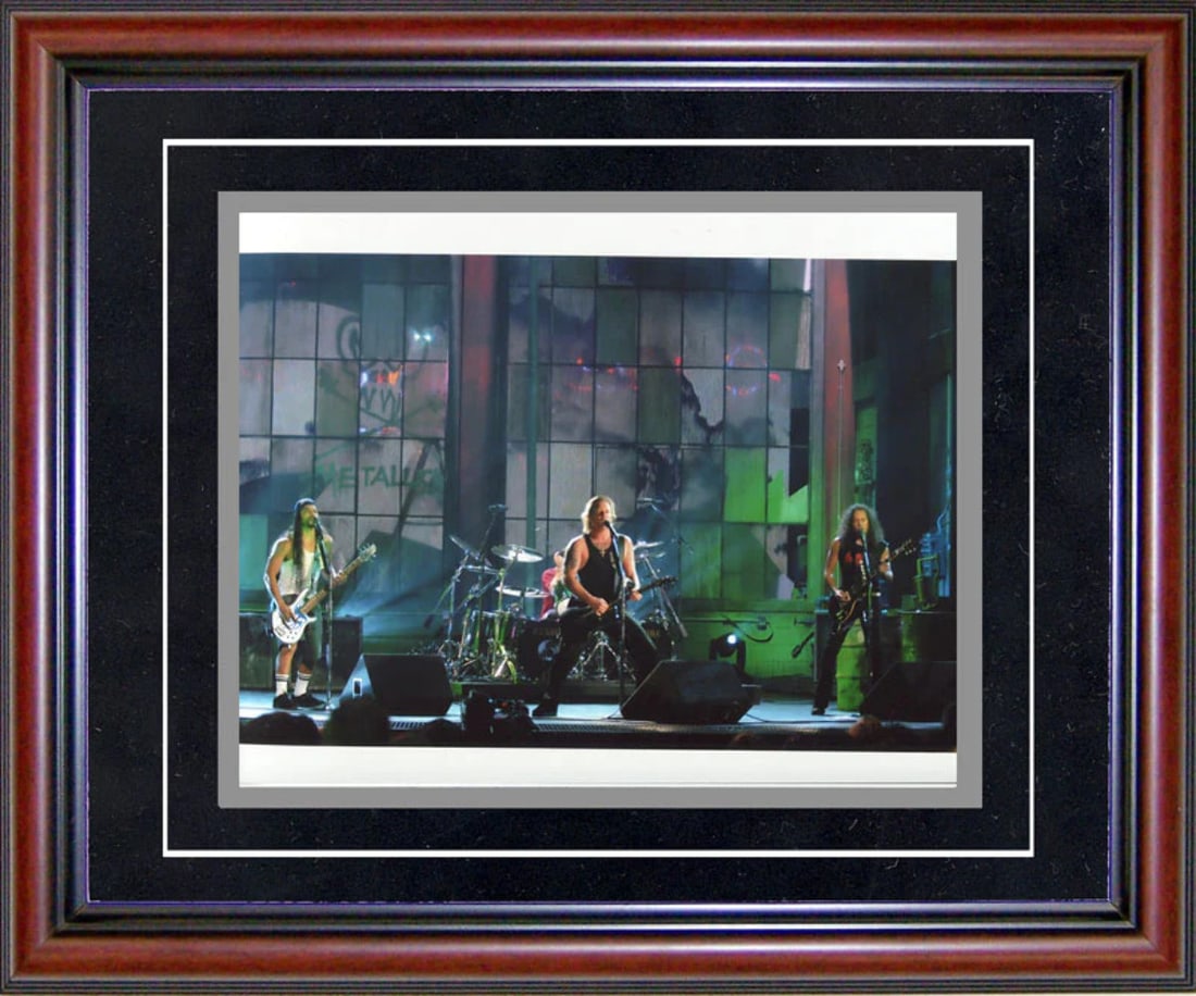 Metallica Unsigned Framed 8x10 Photo: Metallica Unsigned Framed 8x10 Photo Metallica Unsigned Framed 8x10 Photo is framed in a cherry wood frame with black on matte white board. This piece features an unsigned photo, and framing options