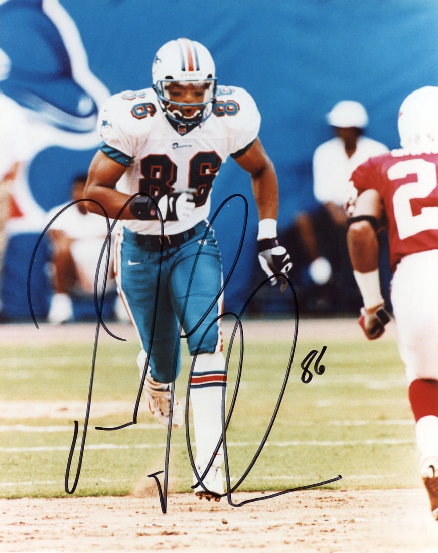Autographed Gadsden Oronde 8x10 Photo: Autographed Gadsden Oronde 8x10 Photo Oronde Gadsden's sharpie signature across the front of this 8x10 photo adds a touch of personality to any sports fan's collection. The photo itself is an impressi