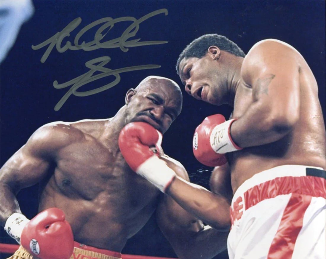 Riddick Bowe Autographed 8x10 Photo: Riddick Bowe Autographed 8x10 Photo Item Specifics: Signed in silver sharpie across the front of the photo Riddick is fighting World Champion Evander Holyfield Item is authenticated by Rich Altman's