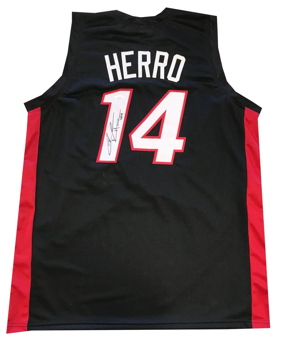 Heat Jersey Autographed By Miami Herro Tyler JSA: Heat Jersey Autographed By Miami Herro Tyler JSA Tyler Herro's sharpie signature across the number on the back of this black Miami Heat jersey is verified by James Spence Authentication, ensuring its