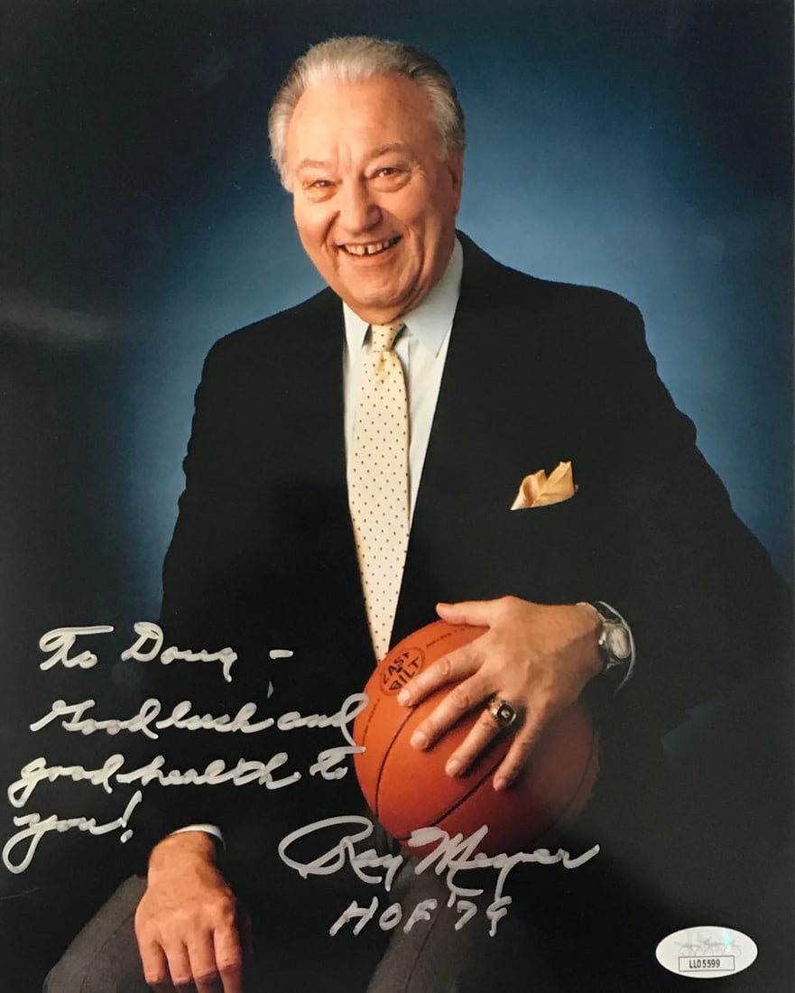Ray Meyer Autographed 8x10 Basketball Photo (JSA): Ray Meyer Autographed 8x10 Basketball Photo (JSA) Ray Meyer's silver sharpie signature across the front of this 8x10 basketball photo reads, "To Doug, Good Luck and good health HOF 79". The James Spen