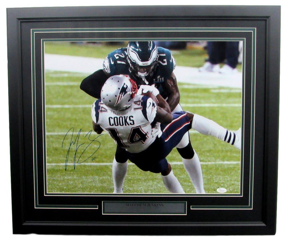 Malcom Jenkins Eagles Autographed/ Signed 16x20 Photo Framed JSA 135611: Malcom Jenkins Eagles Autographed/ Signed 16x20 Photo Framed JSA 135611 Malcom Jenkins, the veteran safety for the Philadelphia Eagles, has signed a stunning 16x20 photo featuring his iconic football 