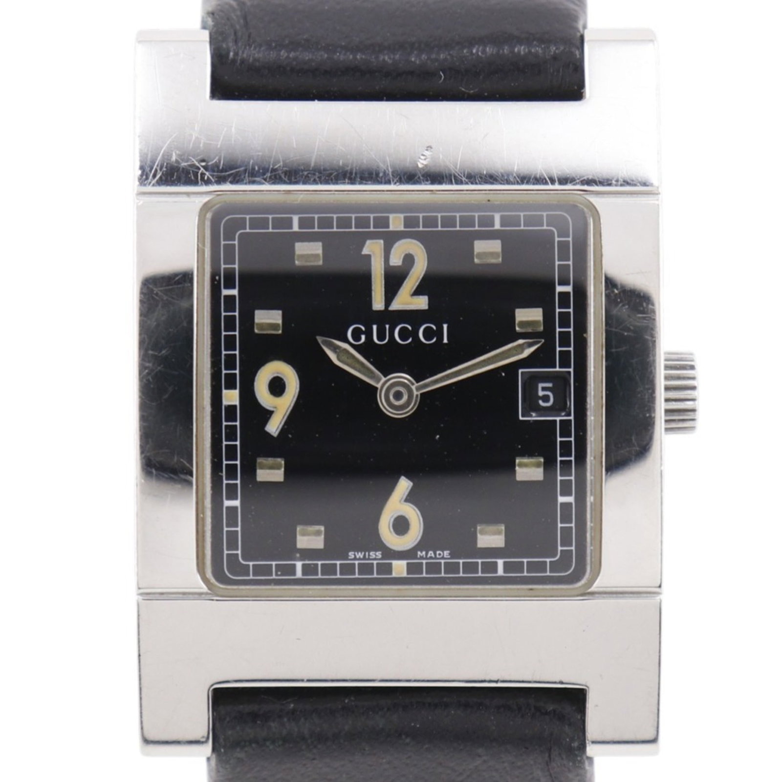 Wristwatch from Gucci: Wristwatch from Gucci Stainless steel case and leather band give this Gucci wristwatch a sleek, sophisticated look. The black dial provides a timeless contrast to the metallic accents, while the 24mm