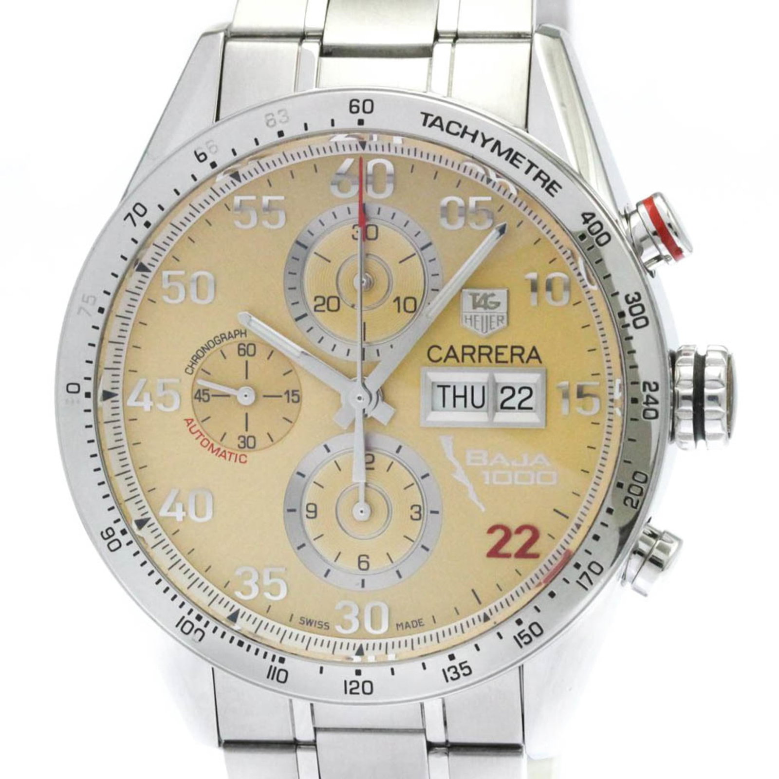 Tag Heuer Wristwatch: Tag Heuer Wristwatch Stainless steel case and band provide a durable foundation for this Tag Heuer wristwatch, featuring a beige dial with gold accents. The sporty design measures 43mm in diameter,