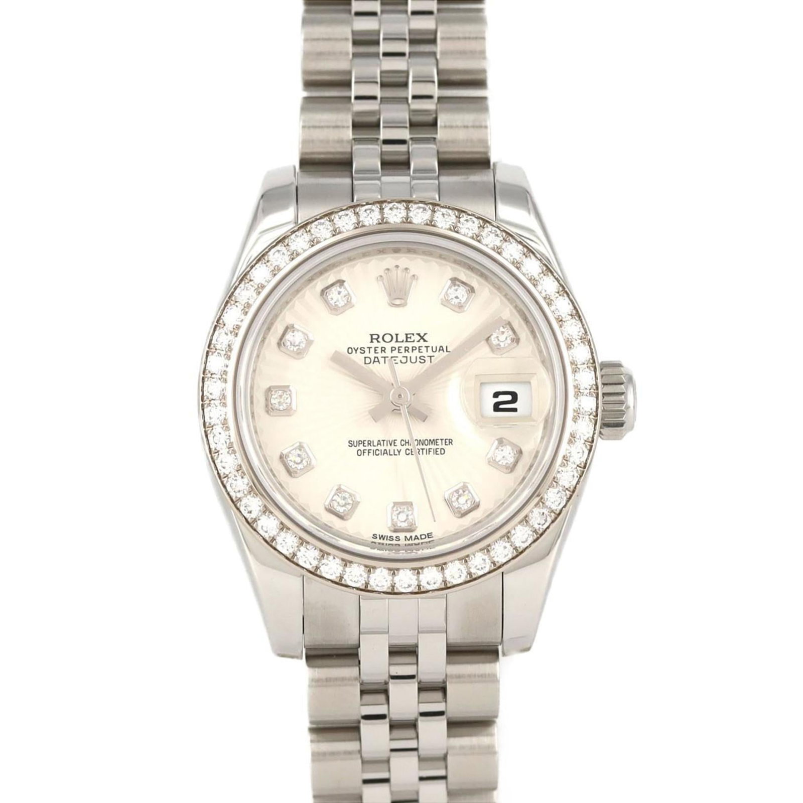Rolex Wristwatch: Rolex Wristwatch Stainless steel case and band provide a sleek, durable foundation for the ivory dial. A few traces of usage are visible, with some minor scratches and dirt, but overall the watch rema