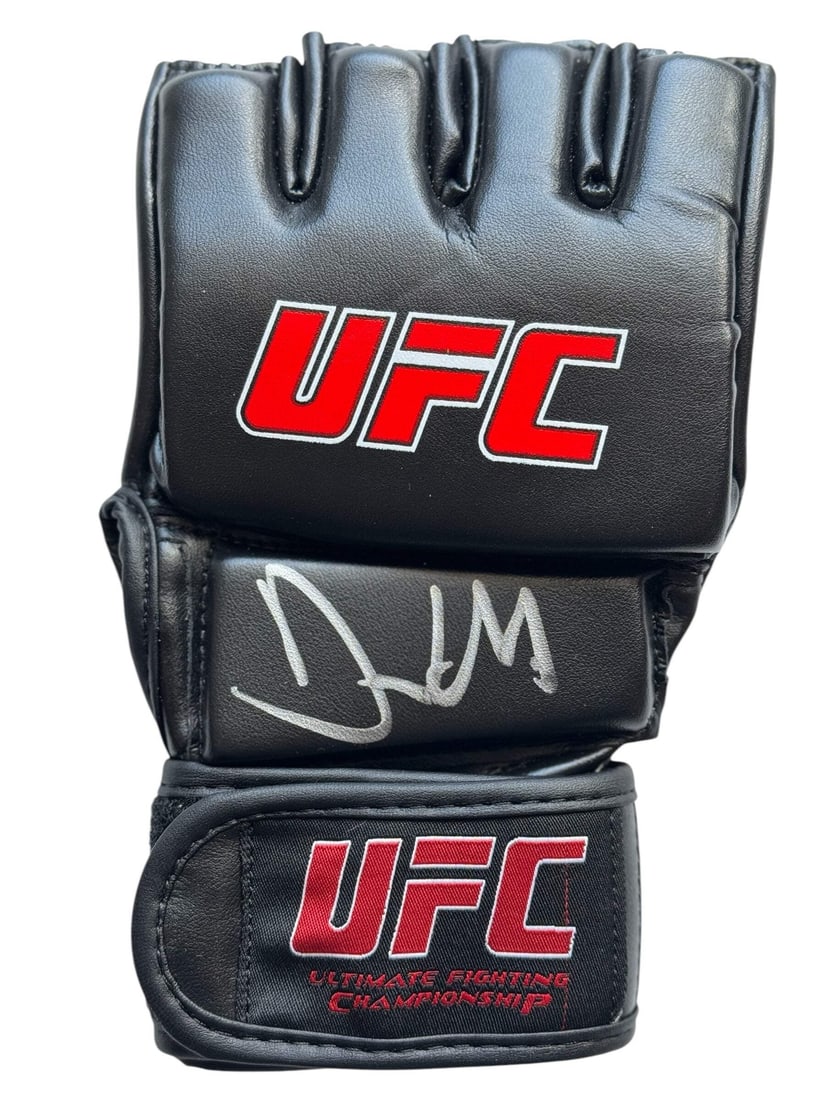 Frank Mir UFC Champion Autographed Auto Signed UFC Glove (JSA): Frank Mir UFC Champion Autographed Auto Signed UFC Glove (JSA) Signed in silver sharpie across the front of the glove, Frank Mir's UFC Championship title proudly adorns this authentic auto signed UFC