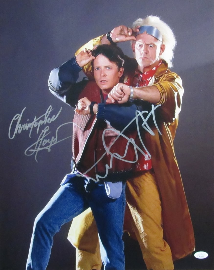 Michael J Fox/ Christopher Lloyd Sign/ Auto 16x20 Photo Back to Future JSA 174006: Michael J Fox/ Christopher Lloyd Sign/ Auto 16x20 Photo Back to Future JSA 174006 Signed by Michael J. Fox and Christopher Lloyd, this 16x20 photo measures 10 inches wide and 24 inches tall, providing