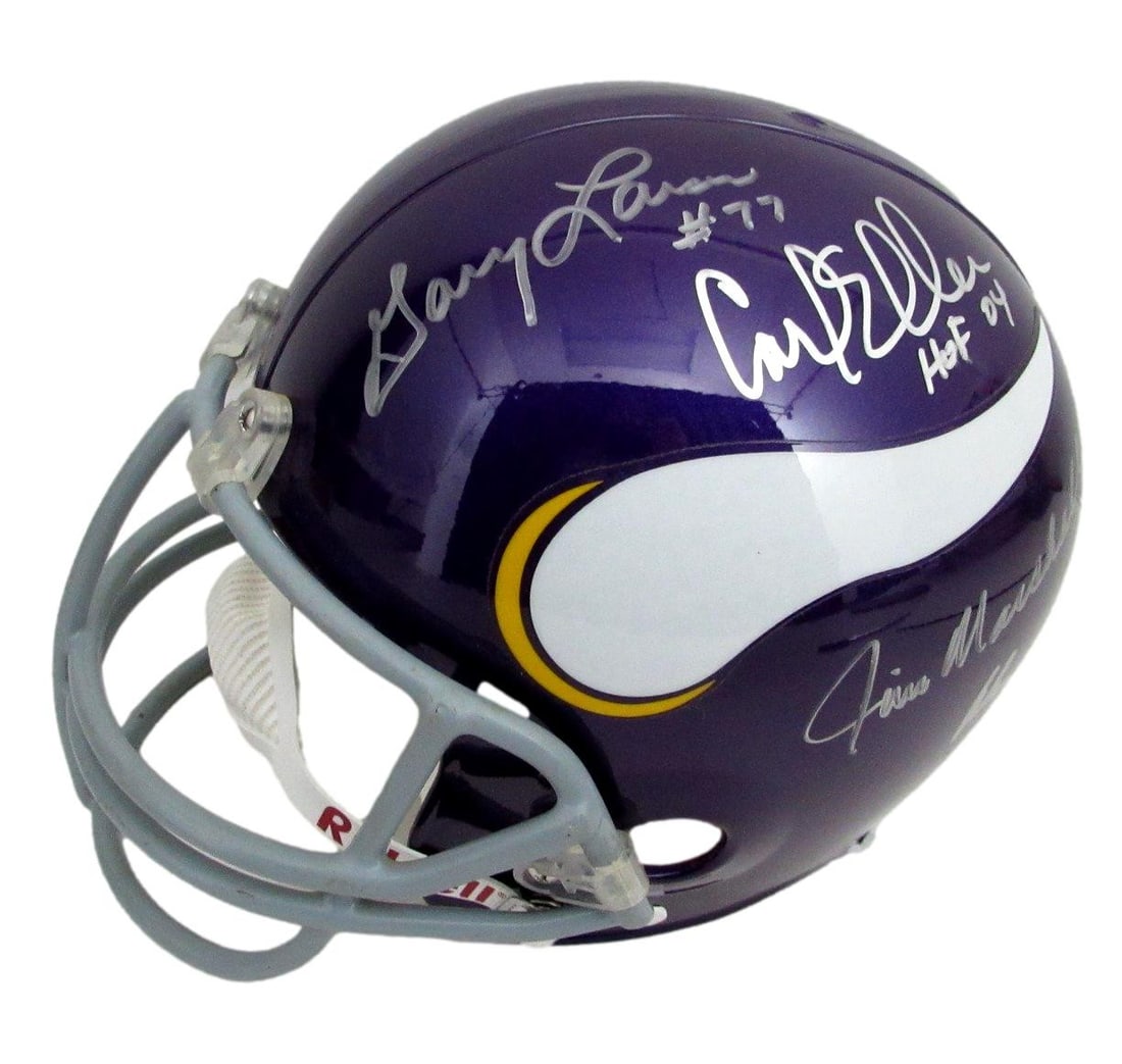 Eller/ Page/ Marshall/ Larsen Signed/ Auto Full Size Replica Helmet Vikings JSA: Eller/ Page/ Marshall/ Larsen Signed/ Auto Full Size Replica Helmet Vikings JSA Signed by Eller, Page, Marshall, and Larsen, this full-size replica helmet is an impressive piece for football fans.