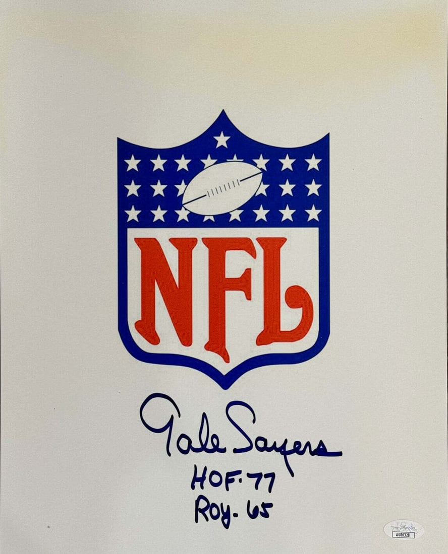 Sayers Gale Autographed Football Photo 11x14 JSA: Sayers Gale Autographed Football Photo 11x14 JSA Signed in black sharpie across the front of the photo, Gale Sayers' inscription "HOF 77 & ROY65" adds a personal touch to this 11x14 football photo.