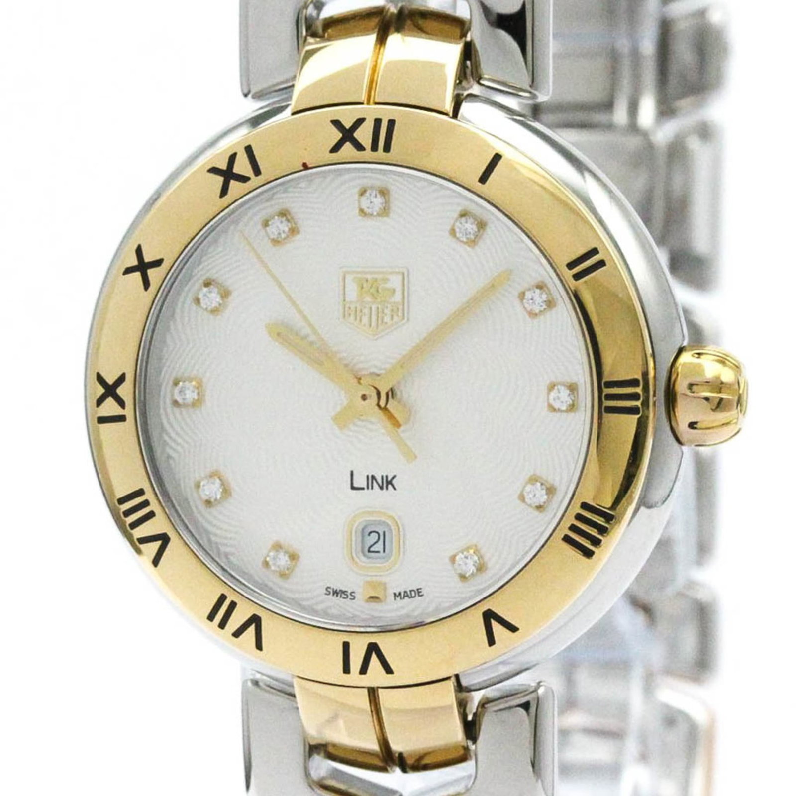Tag Heuer Wristwatch: Tag Heuer Wristwatch Gold Plated, Stainless Steel Case and Pink Gold Plated, Stainless Steel Band. This Tag Heuer wristwatch boasts a silver dial and measures 29mm in diameter, making it a stylish acc