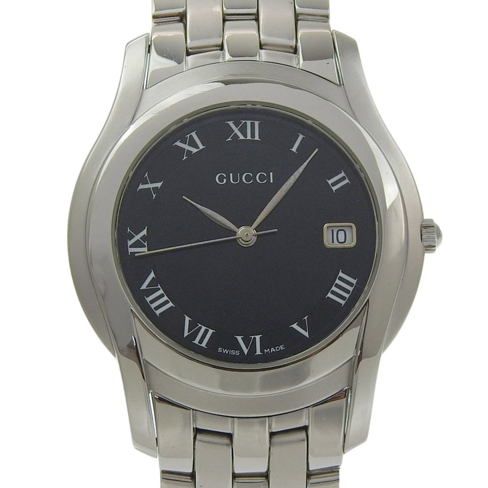 Wristwatch from Gucci: Wristwatch from Gucci Stainless steel case and band provide a sleek, modern look for the Gucci wristwatch. The black dial stands out against the metallic backdrop, adding to the watch's sophisticated 