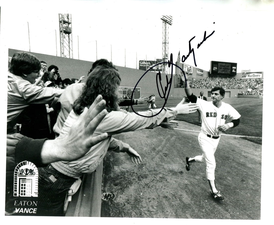 Carl Yastrzemski Autographed Baseball Photo: Carl Yastrzemski Autographed Baseball Photo Signed by Hall of Famer Carl Yastrzemski, this 8x10 photo bears his signature in blue sharpie across the front with a personal inscription. The James