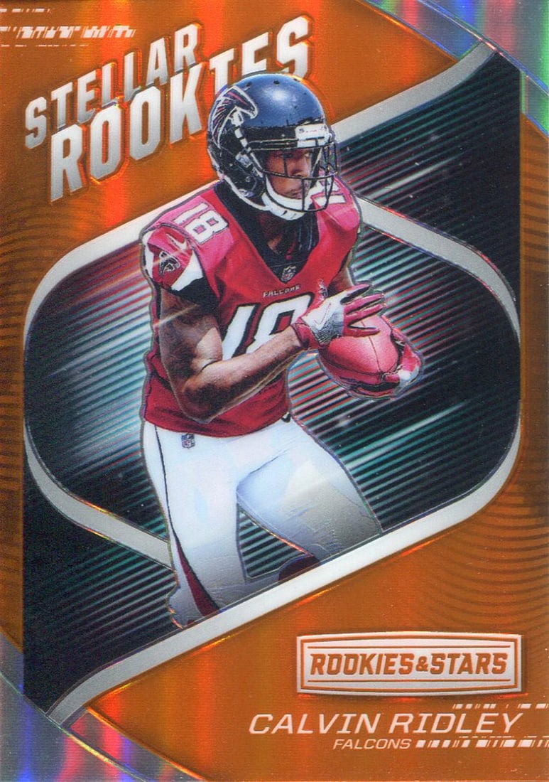 Calvin Ridley 2018 Panini Rookie and Stars Stellar Rookies Orange Rookie Card: Calvin Ridley 2018 Panini Rookie and Stars Stellar Rookies Orange Rookie Card Calvin Ridley's 2018 Panini Rookie and Stars Stellar Rookies Orange Rookie Card is a highly sought-after collectible, feat