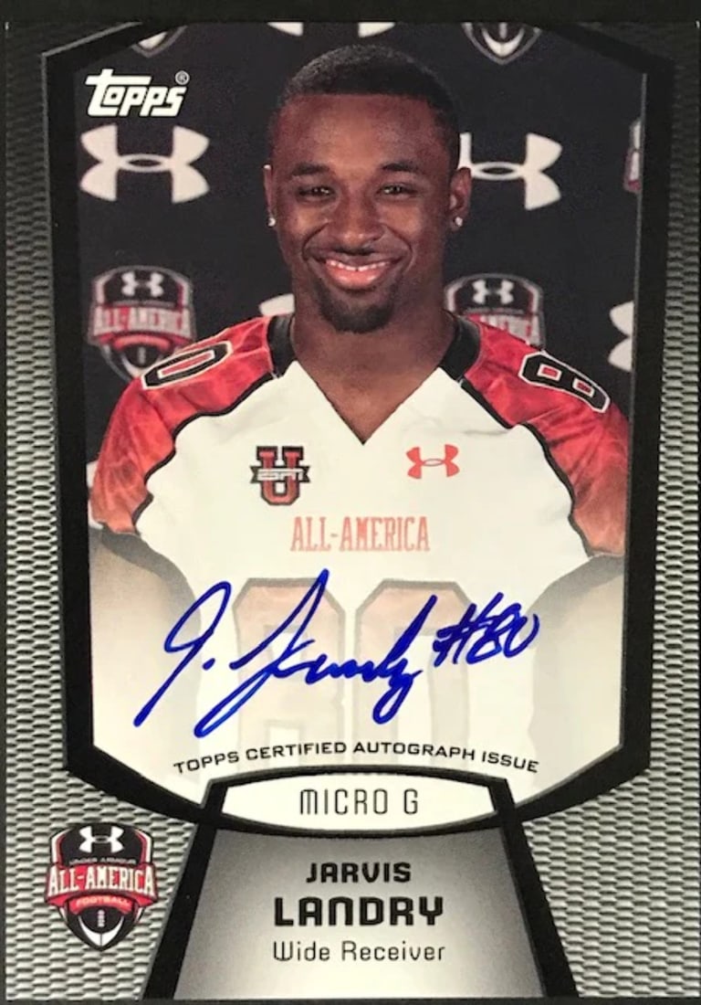 Autographed 2011 Topps Card by Jarvis Landry: Autographed 2011 Topps Card by Jarvis Landry Signed in blue pen across the front of the card, Jarvis Landry's autograph adds a unique touch to this 2011 Topps baseball card. The card comes with a