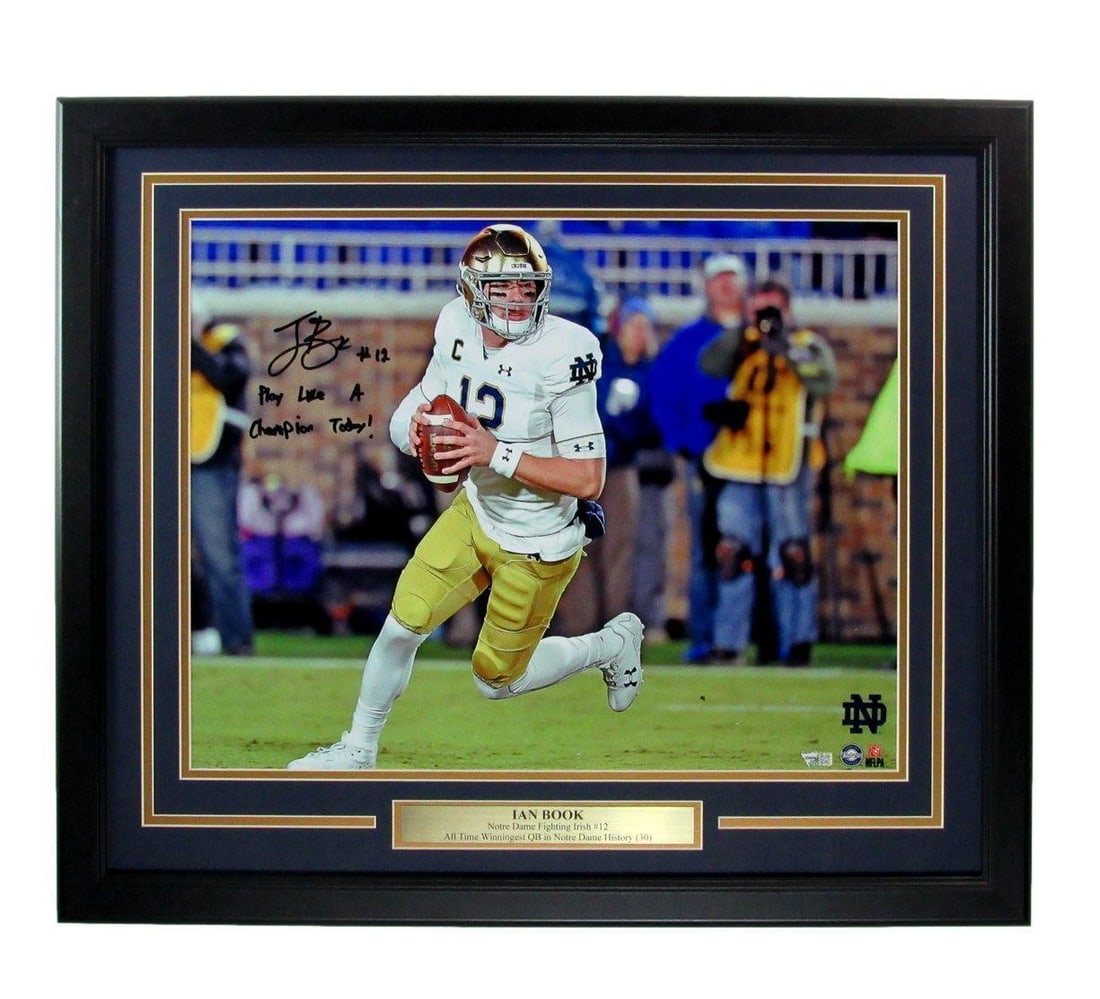 Ian Book Autographed/ Inscribed 16x20 Photo Notre Dame Framed Fanatics: Ian Book Autographed/ Inscribed 16x20 Photo Notre Dame Framed Fanatics Autographed photo by Ian Book, Notre Dame's talented quarterback, bears his signature on a 16x20 inch frame. The item comes with