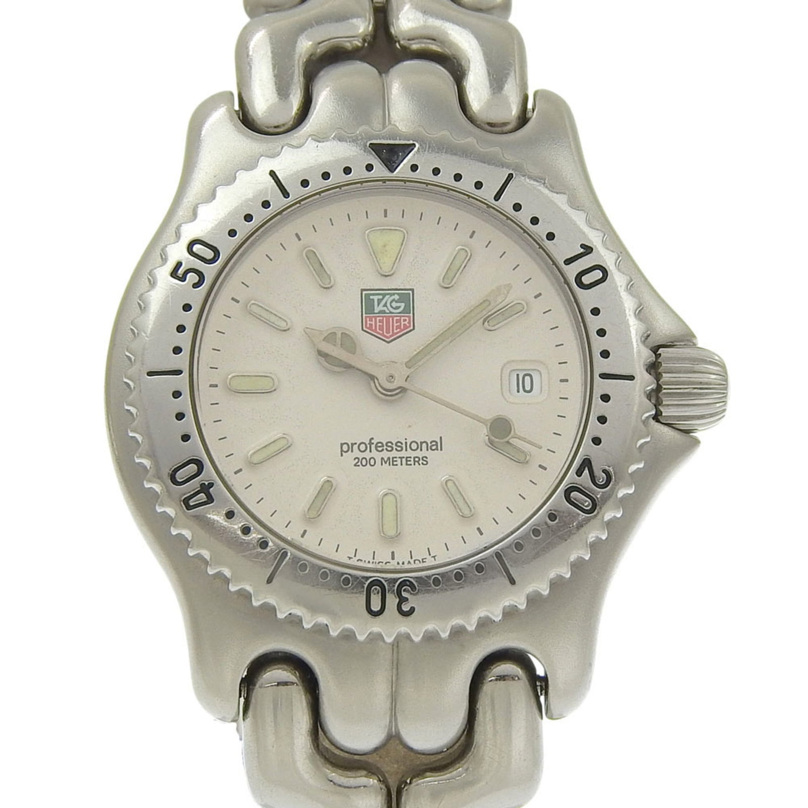 Tag Heuer Wristwatch: Tag Heuer Wristwatch Stainless steel case and band provide a sleek, modern look for the Tag Heuer wristwatch. The white dial adds a touch of elegance to this classic timepiece, which features a diamet