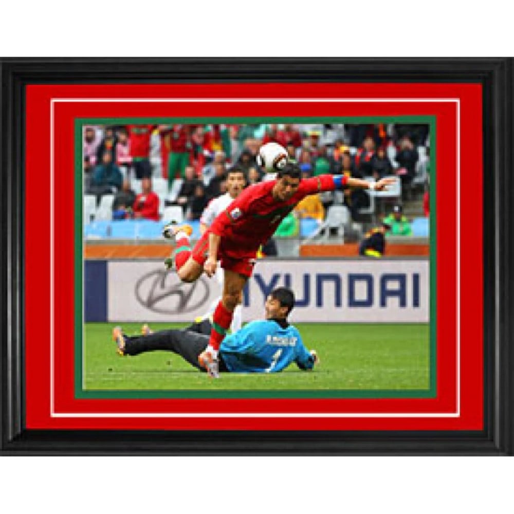 Cristiano Ronaldo Framed Ball Behind Back Portugal vs North Korea 11x14 Photo: Cristiano Ronaldo Framed Ball Behind Back Portugal vs North Korea 11x14 Photo This framed photo measures 11x14 inches and captures Cristiano Ronaldo in action, showcasing the ball behind his back duri