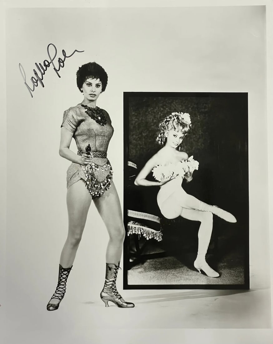 Loren Sophia Autographed 8x10 Photo Celebrity: Loren Sophia Autographed 8x10 Photo Celebrity Sophia Loren's striking gaze captures the essence of her iconic presence in this black and white 8x10 photo. The sharpie signature across the front adds