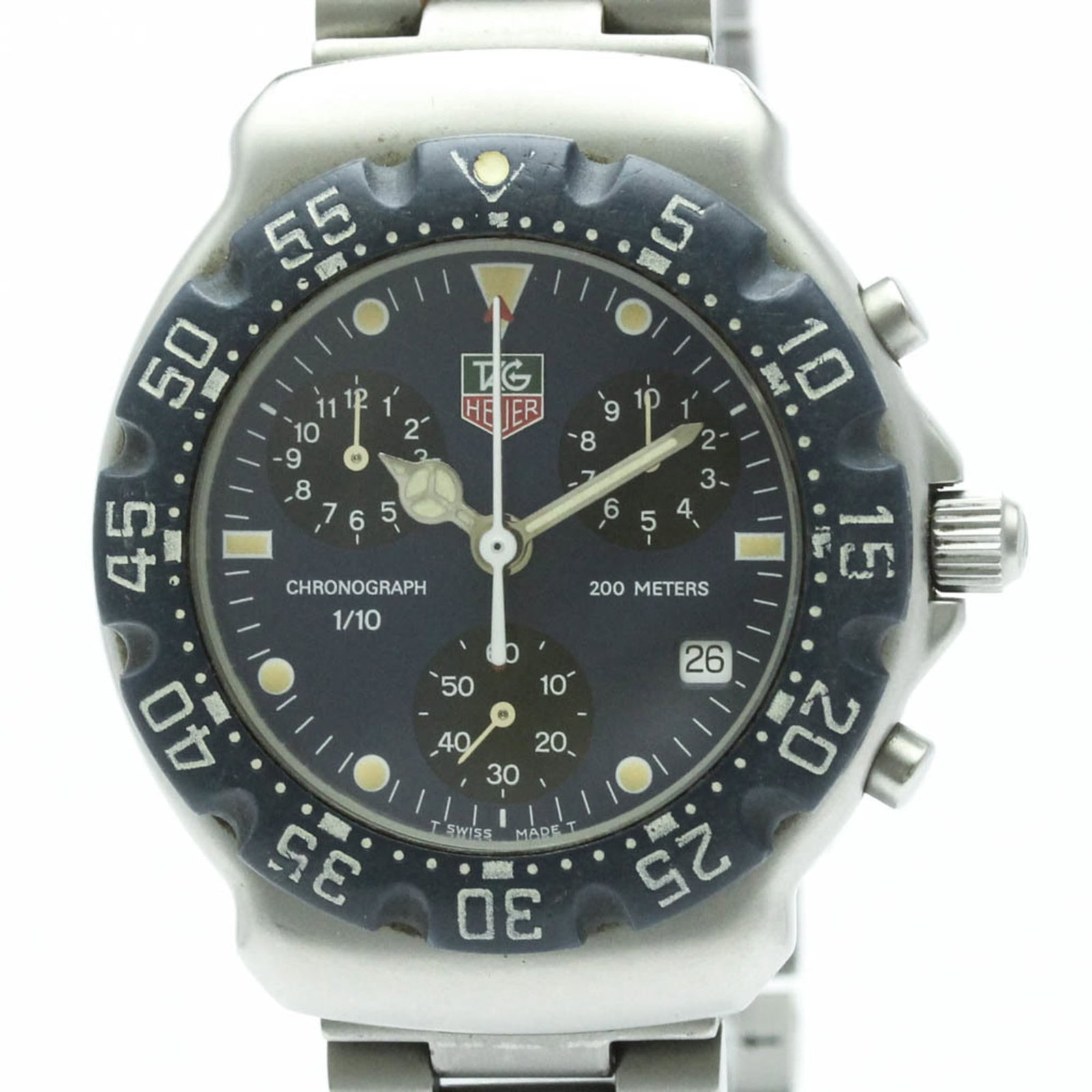 Tag Heuer Wristwatch: Tag Heuer Wristwatch Stainless steel case and band provide a durable foundation for this Tag Heuer wristwatch, featuring a striking blue dial. With its sporty design and 38mm diameter, it's a stylish 
