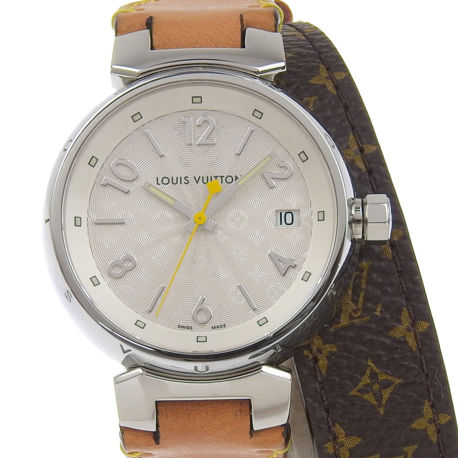 Louis Vuitton Wristwatch: Louis Vuitton Wristwatch Stainless steel case and canvas band make for a unique combination in this Louis Vuitton wristwatch. The white dial stands out against the sleek metal, adding a touch of elega