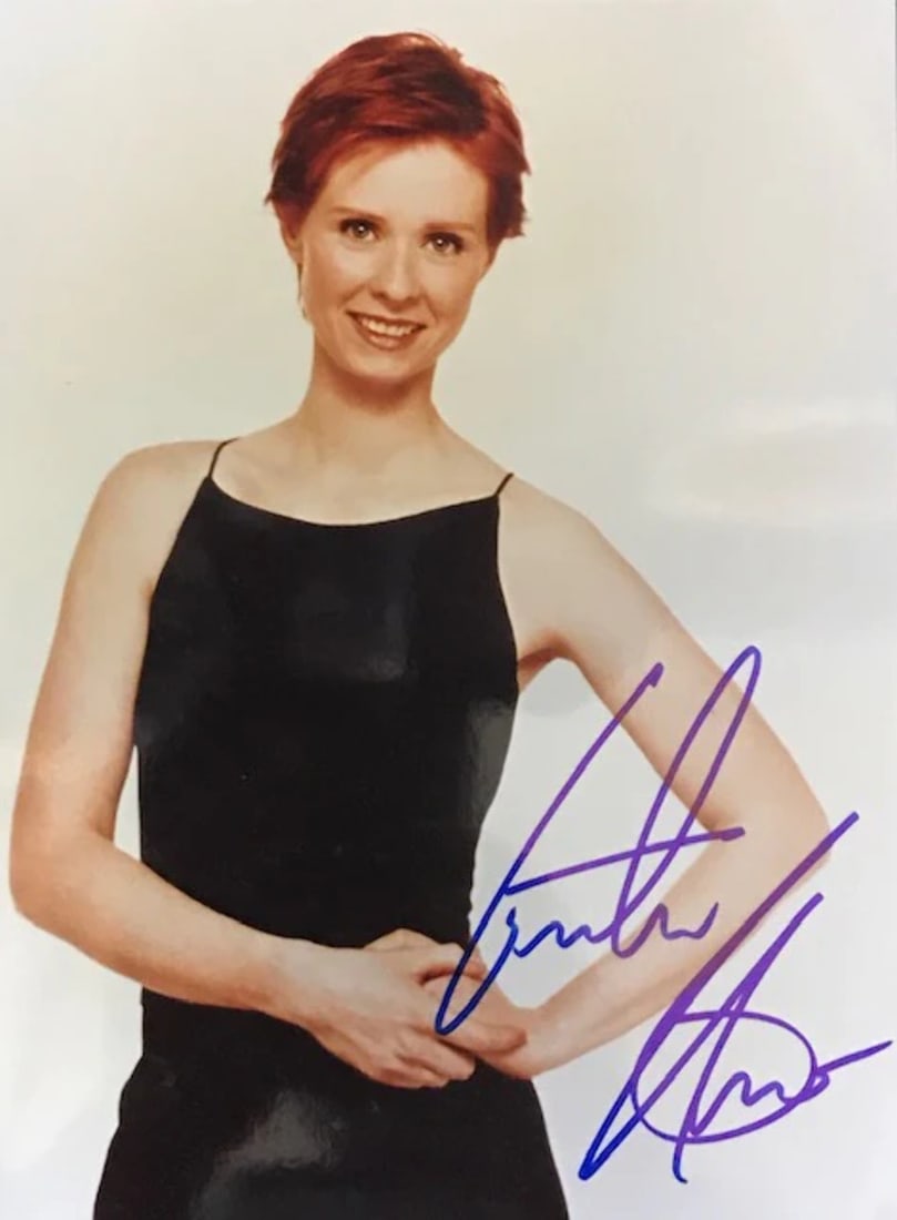 Nixon Cynthia Autographed 8x10 Celebrity Photo: Nixon Cynthia Autographed 8x10 Celebrity Photo Cynthia Nixon's 8x10 celebrity photo bears her signature in blue sharpie across the front, making for a unique and intriguing piece. This signed photo is